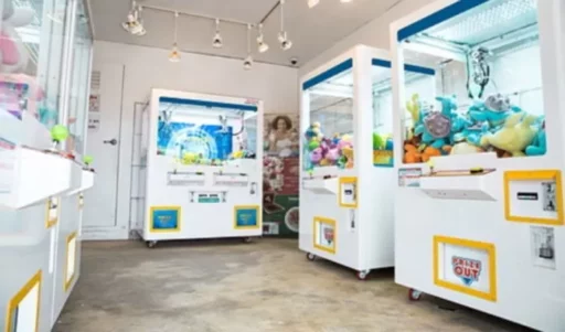 A man in his 20s gets trapped inside a ‘claw machine’ while playing around with friends… Police and emergency services dispatched